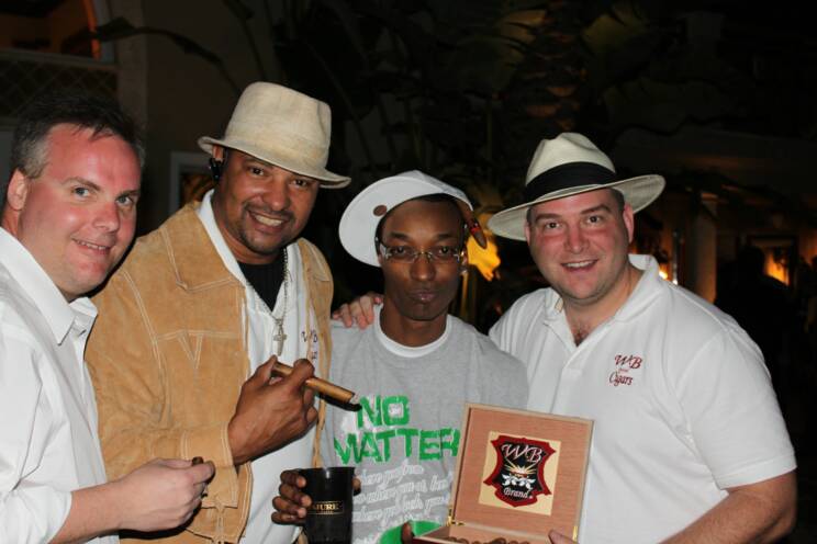 John Ost, Walter Briggs, Rapper "TI" and Johnny Kovar at the House of Conjure Super Bowl Party